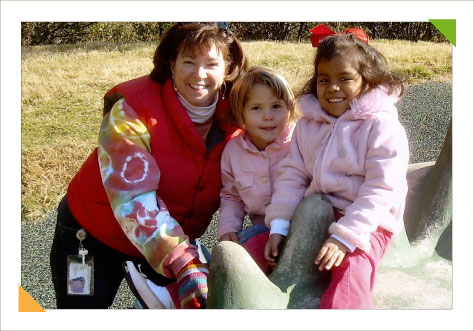 Educational consulting expert Kim Hughes with two happy, actively learning children