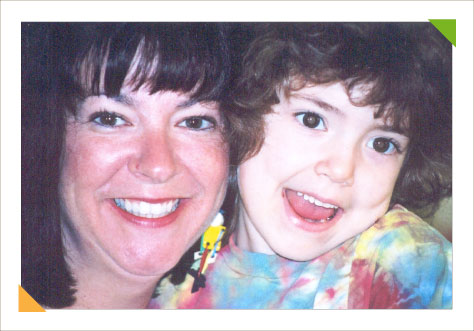 Educational consulting experting expert Kim Hughes with a beautiful young child with special needs