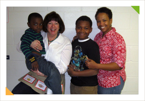 Educational consulting experting expert Kim Hughes with a young student