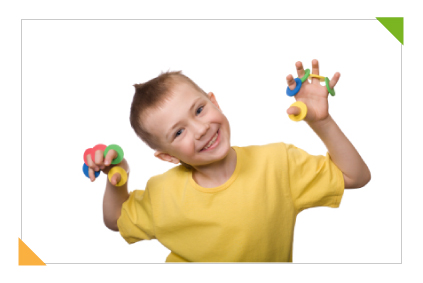 Playful kindergarten child in classroom